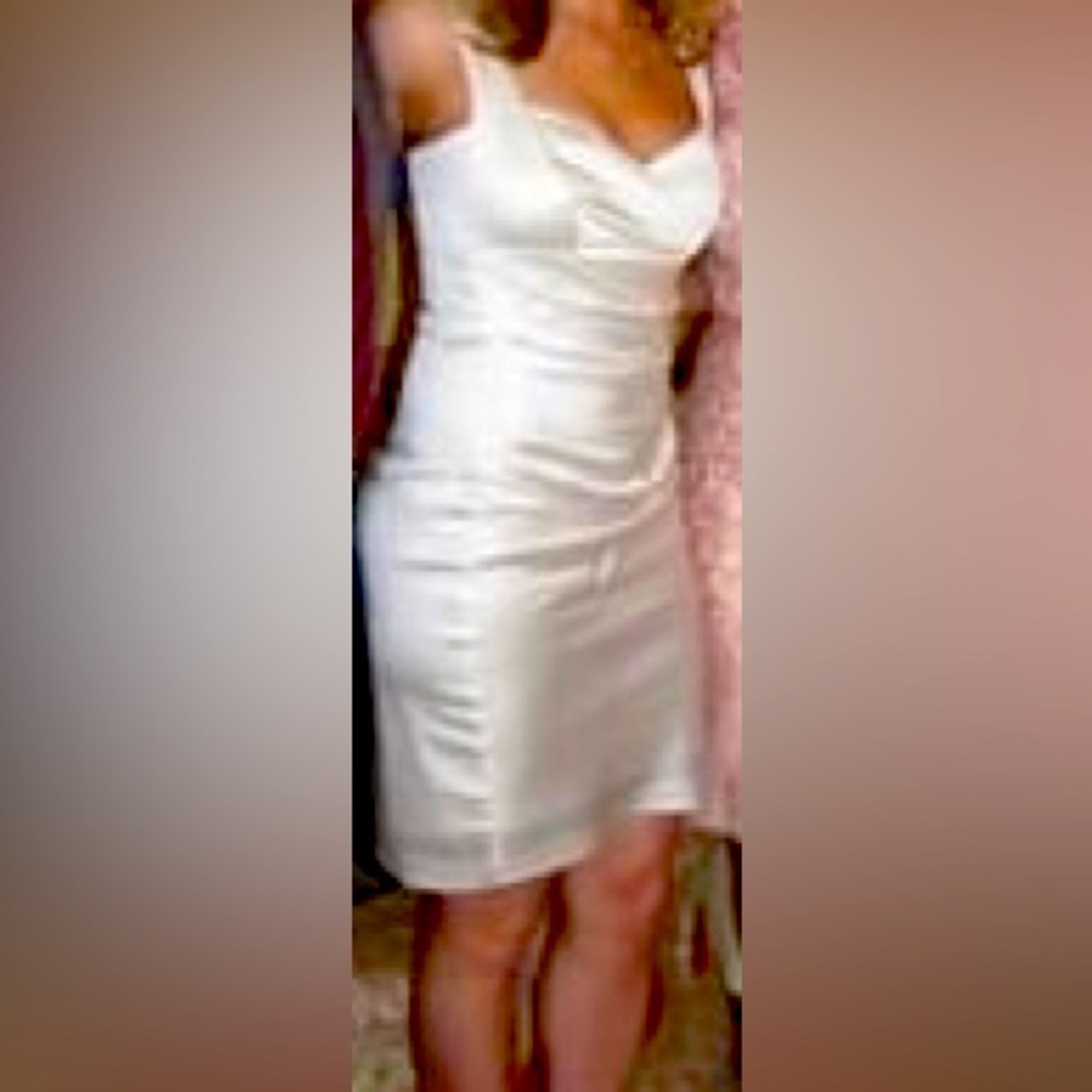 Off white mid length dress.